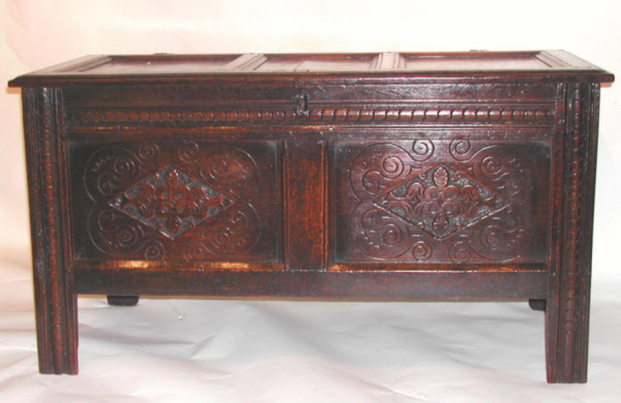 An early 17thc Oak panelled Coffer, English C1660 - 80