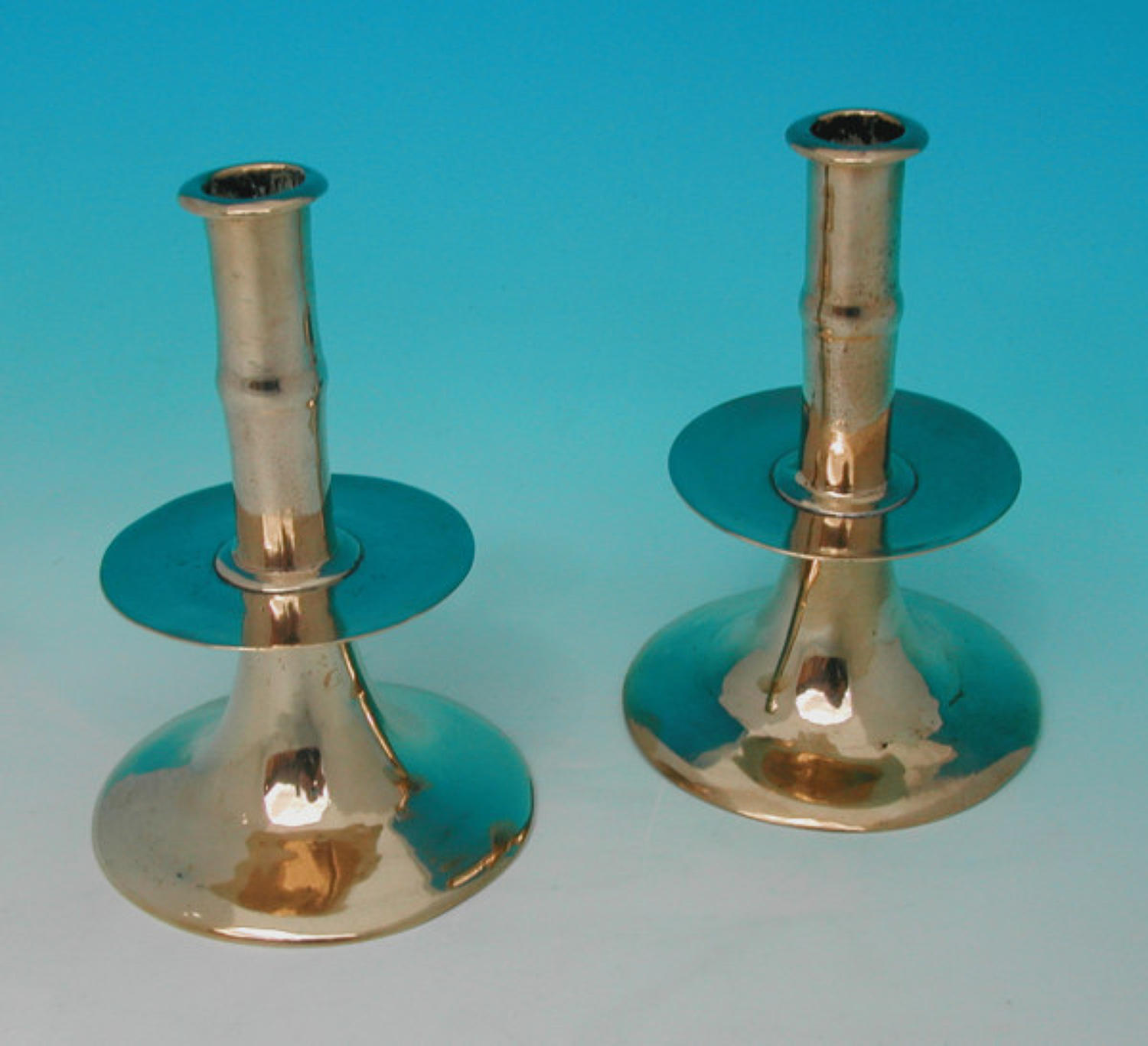 A rare pair of 17thc Brass Trumpet Base Candlesticks. English. C1640-6