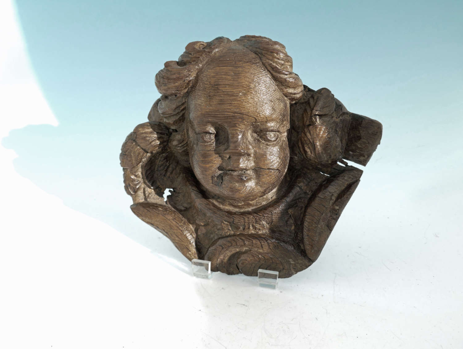 Antique 15thc Carved Oak Head Of A Cherub Complete With Shaped Ruff.
