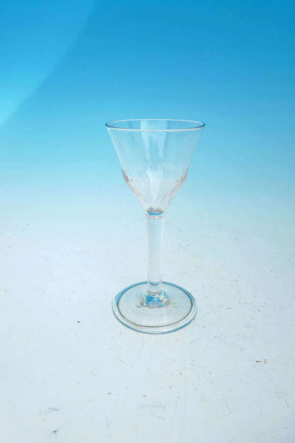 Early 18thc Wine Glass With Basal Fluted Bowl And Folded Foot. English