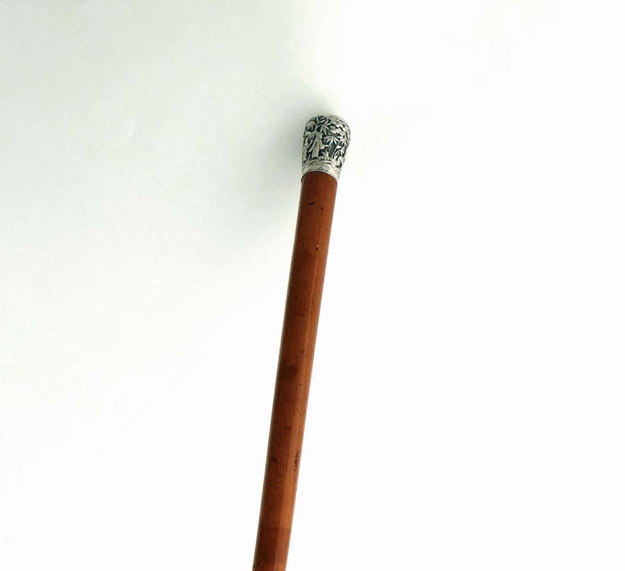 Antique Silver Topped Malacca Stick With Engraved Oriental Handle.