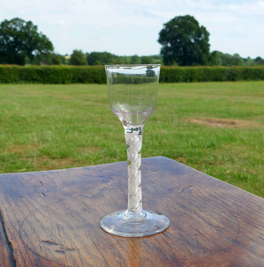 Antique Early 18thc Opaque Twist Wine Glass With Ogee Bowl And Conical Foot. English C1760
